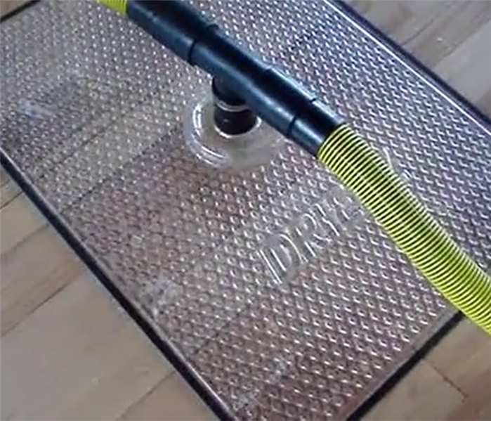 water extraction on hardwood floors